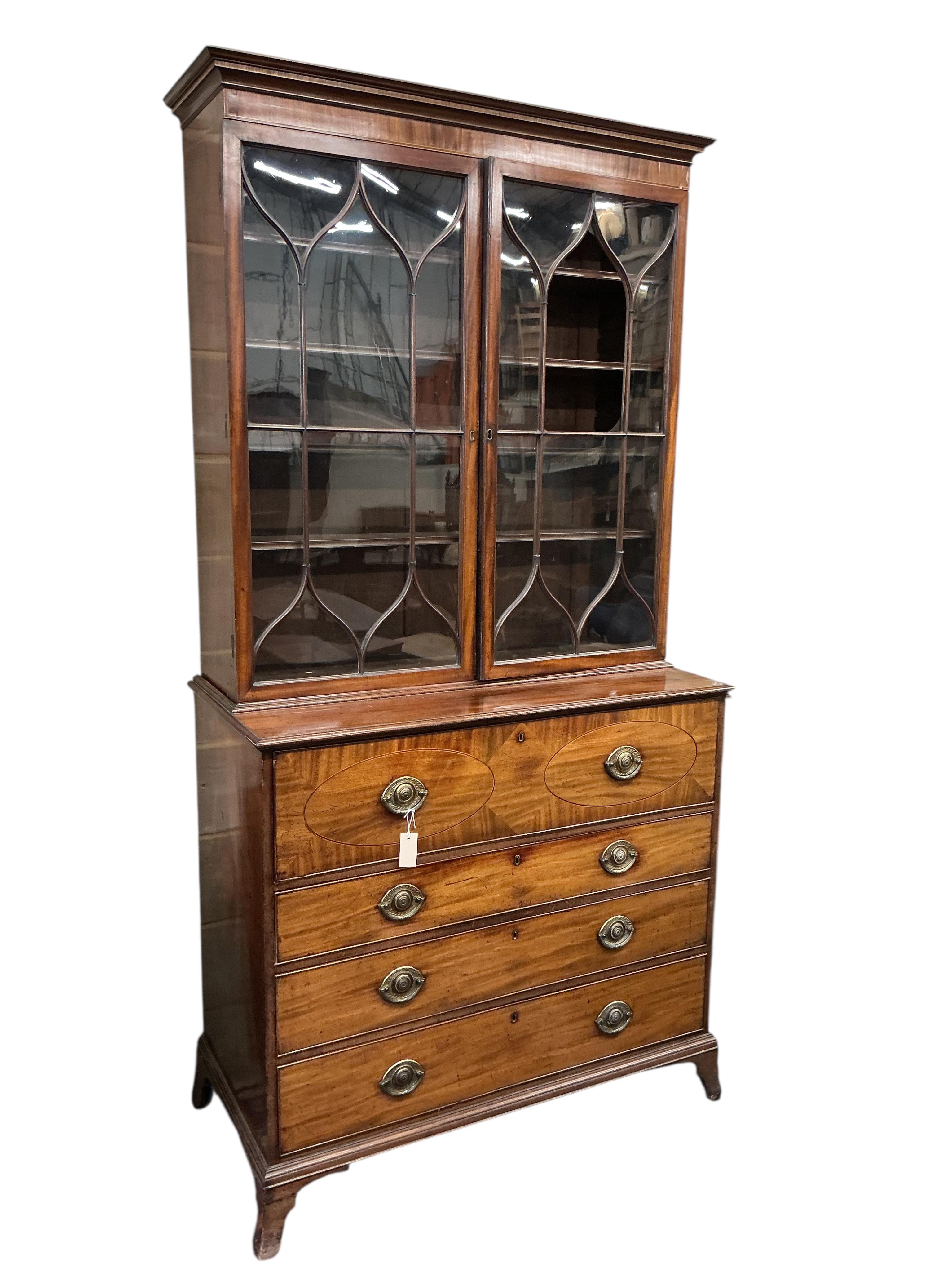 A George III mahogany secretaire bookcase, width 116cm, depth 57cm, height 234cm, one glass pane missing